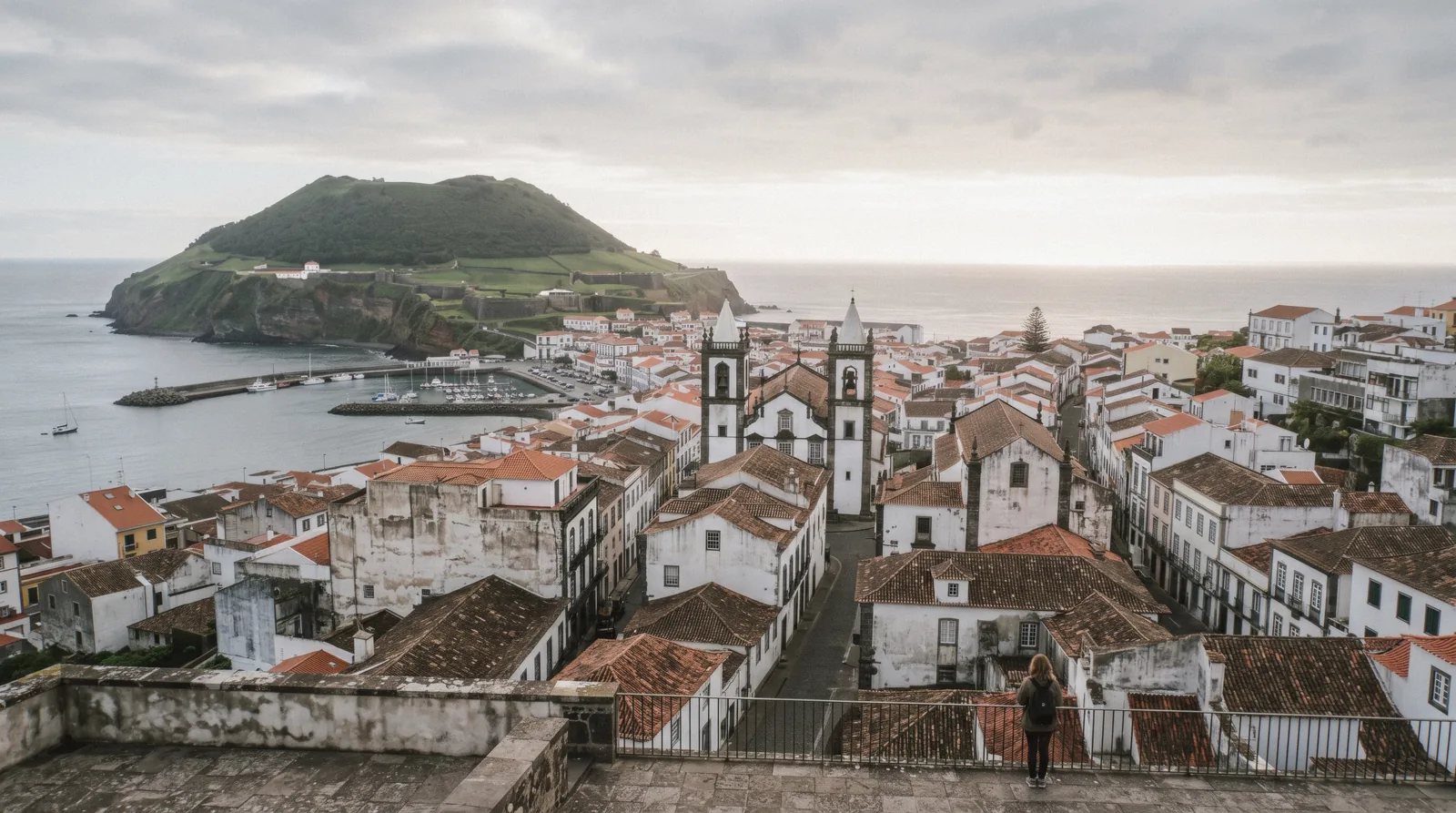 Angra do Heroísmo's 16th-century grid of streets running down to its harbour, seen from the fort above