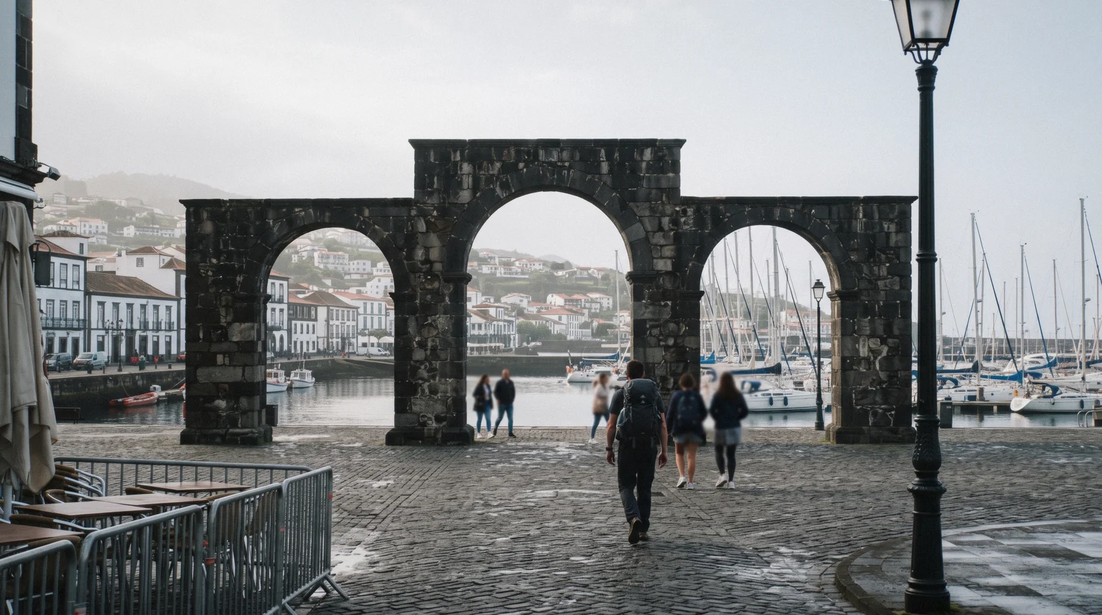 The port town of Ponta Delgada on São Miguel with its basalt waterfront gates in soft morning light