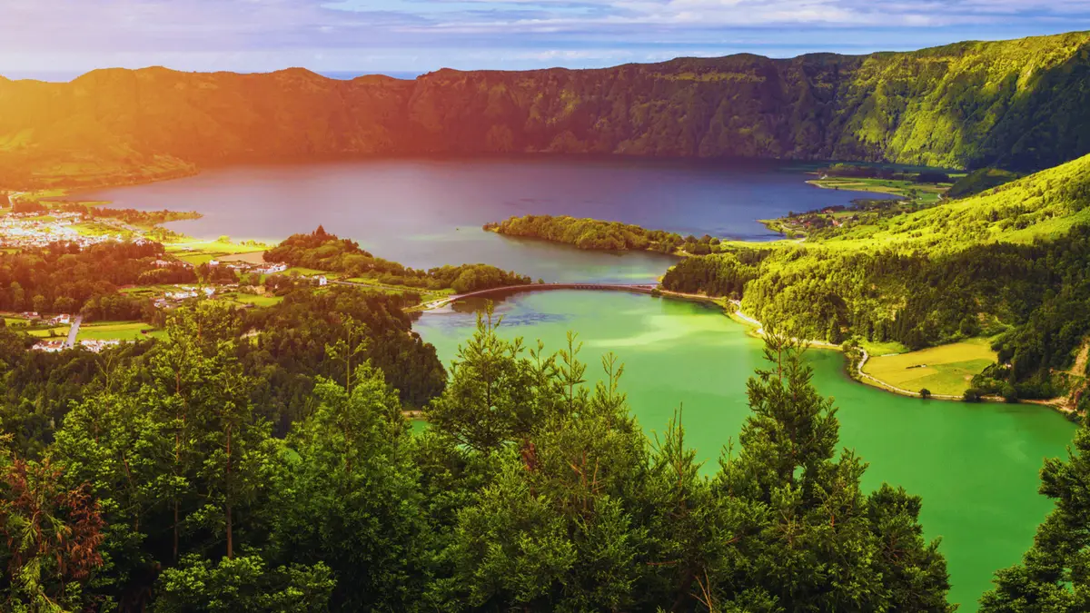 Sunset over the green and blue crater lakes of Sete Cidades on this two-day Azores tour
