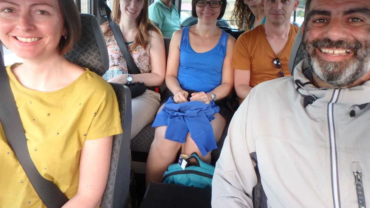 A guide and passengers smiling inside the jeep on a private Santa Maria, Azores safari