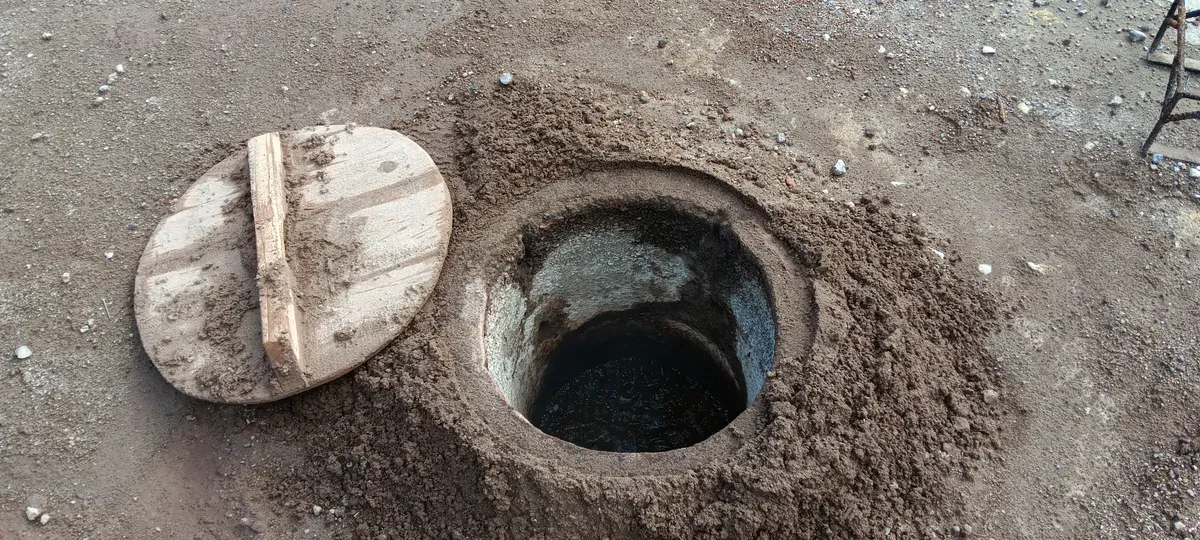 Cooking holes in the fumarole field on the shore of Lagoa das Furnas