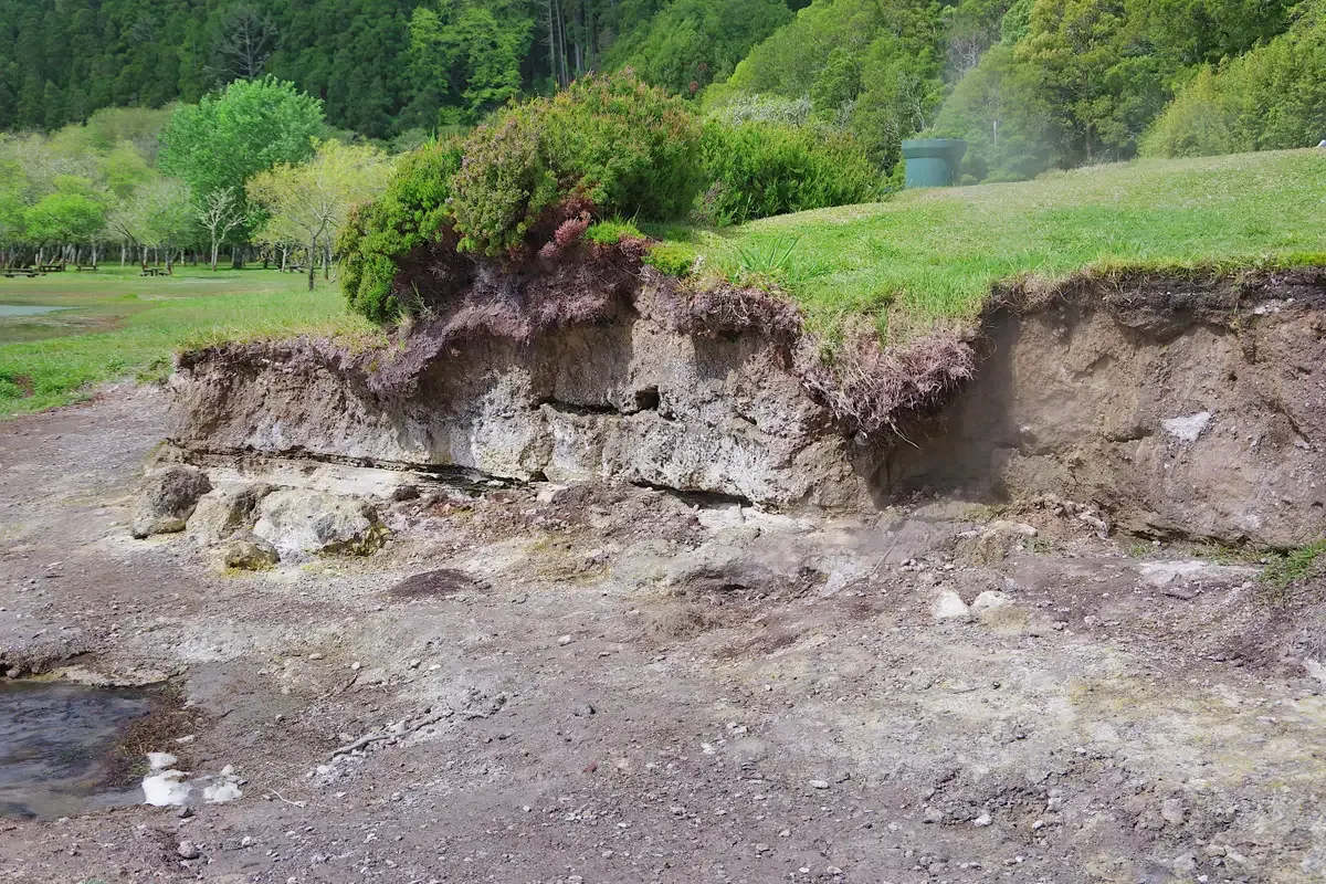 Steaming volcanic ground at the Caldeiras on the shore of Lagoa das Furnas, Furnas, São Miguel