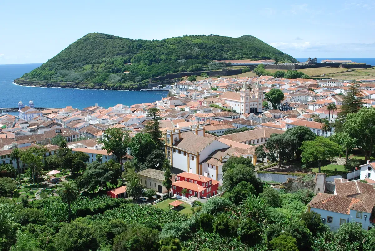 View over Angra do Heroísmo on Terceira island with Monte Brasil behind the red roofs